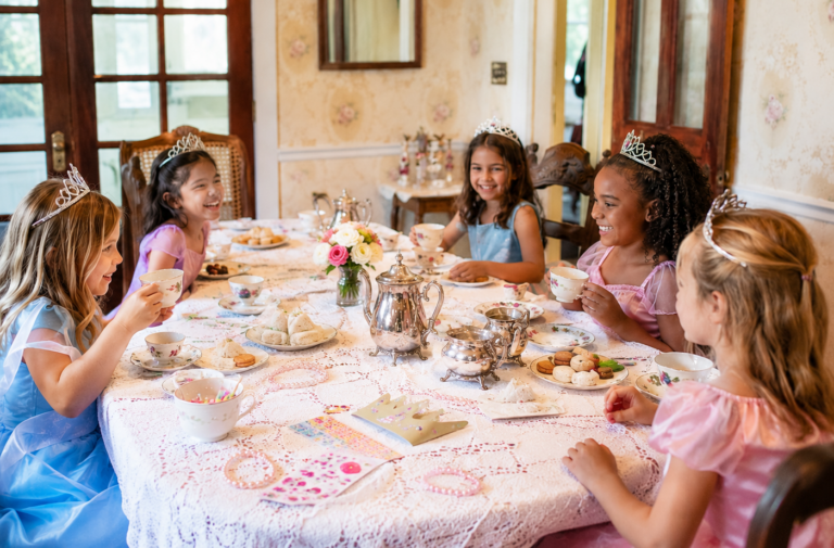 seated children having a tea party